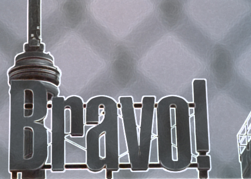 Bravo The C.N. Tower view from Queen Street through fence